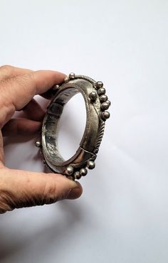 Old articulated silver bracelet - Berber from the AKKA / TATA region - Morocco Early 20th century Inner diameter: 5.9 cm Width: 1.5cm Total Weight (Gr.): 95.40 grams Feel free to contact me for any question about this item, I will be happy to answer you as soon as possible. Visit my Etsy Shop: https://www.etsy.com/fr/shop/TIFINAGH Réf : SMB039 Antique Oxidized Bracelet, Antique Metal Bracelets For Festivals, Heavy Vintage Silver Cuff Bracelet, Antique Metal Bangle With Oxidized Finish, Vintage Silver Solid Cuff Bracelet, Unique Antique Silver Bracelets With Oxidized Finish, Unique Antique Silver Bracelet With Oxidized Finish, Vintage Silver Bangle With Oxidized Finish, Antique Heavy Bracelet Jewelry