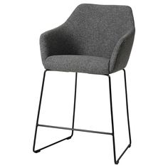 an upholstered chair with black metal legs and grey fabric, on a white background