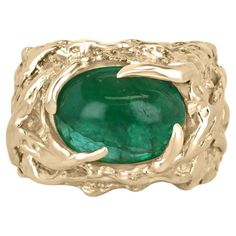 Introducing a stunning solitaire men's ring featuring a mesmerizing cabochon cut emerald of oval shape. The emerald is uniquely set in an east-to-west orientation, showcasing its vivid dark green color with exceptional luster and captivating clarity. The ring itself boasts a thick nugget-styled prong setting, expertly crafted in 14k yellow gold, adding a touch of elegance and sophistication to the overall design. This exquisite piece is a perfect blend of timeless style and natural beauty, makin Mens Emerald Rings, Gold Nugget Ring, Emerald Cabochon, Mens Pinky Ring, Oval Jewelry, Mens Gemstone Rings, Emerald Earrings Studs, Mens Gold Rings, Gold Nugget