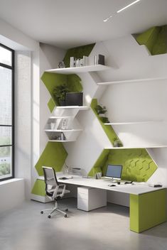 an office with green and white decor in the corner, along with shelving units