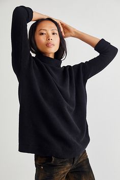 **Fit:** For a more tailored fit, size down. Heavy knit ribbed tunic sweater featured in a slouchy, oversized fit. * Stretchy fabric * Sleek mock neck Convertible Sweater, Slouchy Sweater, Free People Style, Organic Cotton Yarn, Heavy Knit, Black Tunic, Tunic Styles, Tunic Sweater, Oversized Sweater