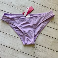 Xhilaration Women’s / Jr’s Lavender Good Coverage Bikini Bottom Sz M Nwt - Good Coverage - Cheeky Style - Has Inner Liner Still Attached - Comes From A Smoke Free Home - Offers Are Considered - Discounts For Bundles - Comment With Any Questions Casual Purple Sports Bra With Moisture-wicking, Purple Seamless Beachwear Bottoms, Casual Purple Moisture-wicking Sports Bra, High Stretch Purple Moisture-wicking Sports Bra, Purple Tie-side Bottom Swimwear For Beachwear, Womens Swim, Color Purple, Bundles, Lavender