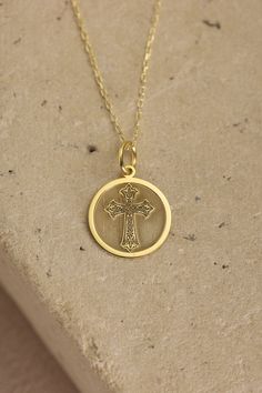 Gold Cross Pendant - Cross Gold Necklace ● Material of pendant: Solid Gold 14k ( REAL GOLD ) ● Metal Stamp: 14k ( REAL GOLD ) ● The pendant is available in 5 sizes: - 12,7 mm / 0.5 inches (Diameter) - 14,0 mm / 0,55 inches ( Diameter ) In the photos - 15,3 mm / 0.6 inches ( Diameter ) - 16,5 mm / 0,65 inches ( Diameter ) - 19,1 mm / 0,75 inches ( Diameter ) ( In the photos the size is 14mm / 0.55 inches Diameter ) ( Jump Ring inner diameter: 4 mm ) ● Material of chain: Solid gold 14k ( REAL GOLD Symbolic Yellow Gold Cross Jewelry, Yellow Gold Coin Pendant For Commemoration, Symbolic Charms Necklaces For Commemoration, Symbolic Yellow Gold Cross Necklace, Symbolic Charms Necklace For Commemoration, Spiritual Yellow Gold Medallion Charm Necklace, 14k Gold Spiritual Round Pendant Charm Necklace, Yellow Gold Coin-shaped Charms Jewelry, Spiritual 14k Gold Charm Necklace With Round Pendant