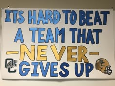 a sign that says it's hard to beat a team that never gives up