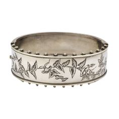 A hinged Victorian bangle. Unmarked, but acid tests as sterling silver. In good condition, the catch is in good working order.  The internal measurements are 5.6 cms (2 1/4 inches) x 4.8 cms (1 7/8 inches). The internal circumference is 16.5 cms (6 1/2 inches), The bangle is 1.8 cms (3/4 of an inch) wide, excluding the bobbles. For more bangles please look at my bracelets and bangles section here; https://www.etsy.com/uk/shop/DaisysCabinet?section_id=16212877&ref=shopsection_leftnav_6 Luxury Victorian Etched Bangle, Luxury Ornate Sterling Silver Bangle, Antique Hinges, The Catch, Silver Gifts, Morning Glory, Uk Shop, Favorite Jewelry, Bangle Bracelets