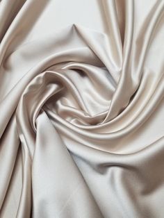 "Beige champagne color fine satin fabric. Usable for apparel,accessories and interior designing. Beautifully made to use for costumes, decorations, weddings and much more. Width : 60\" inches Color : Khaki / Beige /champagne Content : Polyester Thank you for your coming! Please read policy before placing an order. Please contact us via ETSY Conversations for more details. Fabrics are sold by the yard. We will continue length of multiple yards . It will come in one piece of the multiple yards you Bridal Color Schemes, Beige Fashion Aesthetic, Champagne Color Scheme, 15 Decorations, Wardrobe Colors, Champagne Fabric, Beige Champagne, Prom Nail, Wedding 2025