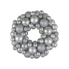 a christmas ornament with silver and silver balls around it on a white background