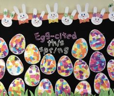 an egg - shaped bulletin board is decorated with easter eggs