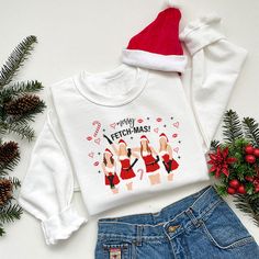 Mean Girls Merry Fetch-Mas Christmas sweatshirt. All SKUs Top Clothing Brands, Blue Words, Top Clothing, Sweatshirt Cute, Holiday Sweatshirt, Sweater Collection, Sweatshirts Pattern, Fit Men, Clothing Brands