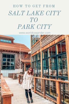 a woman standing on a wooden walkway with the words how to get from salt lake city to park city