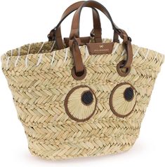 This woven natural seagrass handbag with iconic applied eyes patches and leather handles is the perfect blend of whimsical and sophisticated. The drawstring closure and unlined interior with a leather slit pocket make it both practical and stylish for any occasion. Made of woven natural seagrass Iconic applied eyes patches Leather handles Drawstring closure Unlined interior with a leather slit pocket Eyes Patches, Paper Eyes, Basket Handbag, Eye Patches, Anya Hindmarch, Leather Handles, Leather Handle, Color Coding, Color Mixing