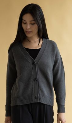 A new take on our cashmere cardigan sweater. 100% Grade A Mongolian cashmere in an oversized boyfriend fit. Features button front & adjustable button sleeve closure. DETAILS FIT: Model is 5'9" and is wearing a size S. FABRIC: 100% cashmere CARE: Hand wash cold with like colors. Lay flat to dry, low iron if needed. Sweater can be washed in a washing machine on delicate style. Lat Flat to dry or machine dry on gentle cycle. Hand washing cashmere can lead to a longer lifecycle. Classic Oversized Cashmere Cardigan, Oversized Classic Cashmere Cardigan, Everyday Relaxed Fit Cashmere Cardigan, Everyday Cashmere Cardigan With Button Closure, Everyday Button-up Cashmere Sweater, Fall Cashmere Button-up Cardigan, Oversized Gray Cashmere Sweater, Cashmere Button-up Outerwear With Button Cuffs, Button-up Cashmere Outerwear With Button Cuffs