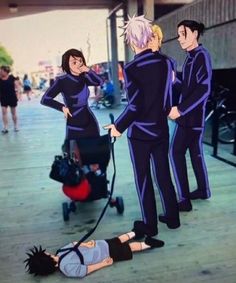 an anime scene with two people and a person on the ground in front of them