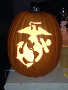 a carved pumpkin sitting on top of a table