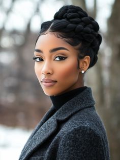 This updo is a sophisticated choice for formal occasions, especially in the winter months when sleek, polished styles shine. The sleek braided bun combines the timeless elegance of a bun with the added flair of intricate braiding. It’s perfect for black women with medium length or long hair looking to achieve a refined look for weddings or corporate events. With its neat finish, this hairstyle suits oval and heart-shaped faces, and its polished nature complements soft, natural makeup. Protective Updos For Natural Hair, Braids Bun For Black Women, Natural Hair Bun Styles Updo, Everyday Bun Hairstyles, Sleek Braided Bun, Protective Styles For 4c Hair, 4c Hair Braids, Braided Updo For Black Women, Styles For 4c Hair