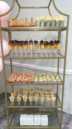 a display case filled with lots of different types of desserts on it's sides