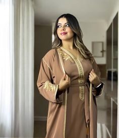 Elegant Embroidered Kimono For Eid, Embroidered V-neck Abaya For Wedding, Elegant Brown Festive Kaftan, Festive Brown Elegant Kaftan, Embroidered V-neck Wedding Abaya, Traditional Floor-length Eid Kimono, Traditional Floor-length Kimono For Eid, Traditional Brown Embroidered Dress, Traditional Long Wedding Robe