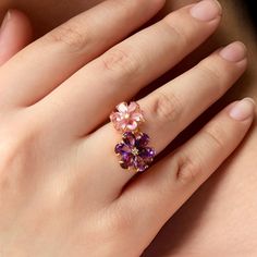 Flora 14K Solid Gold Diamond Natural Amethyst and Pink Sapphire Toi et Moi Double Flower Blossom Ring *Metal: 14K Solid Gold (Yellow, White, or Rose) *Gemstone:      - **Pink Sapphire      - Cut: Pear-Cut      - Color: Pink     - Size: 6 Pieces 3 * 5 mm     - Total Carat Weight (CTW): 1.20     - **Purple Amethyst      - Cut: Pear-Cut      - Color: Purple     - Size: 6 Pieces 4 * 6 mm     - Total Carat Weight (CTW): 2.10     - Ring Size: Available in various sizes, custom sizes upon request *Diamonds:    - Color: Gold   - Clarity: VS    - Total Carat Weight (CTW): 0.03 Embrace the enchanting beauty of blooming flowers with this Toi et Moi Double Flower Blossom Ring, a celebration of color and nature. The vibrant Amethyst and delicate Pink Sapphire gemstones are intricately arranged in a stu Pink Tour, Birthday Ring, Solid Gold Rings, Amethyst Purple, Ring Metal, Blossom Flower, Sapphire Gemstone, Flower Ring, Flower Jewellery