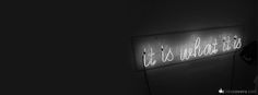 a black and white photo of a neon sign that reads it's all about us