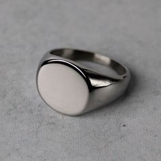 Premium Stainless Steel Color: Steel Height: Approx 15mm Width: Approx 17mm Available Sizes 7 / 8 / 9 / 10 / 11 / 12 (Choose Your Us Ring Size) Safe In Water No Tarnish No Green Finger Also Available In Gold Classic Oval Stainless Steel Rings, Classic White Oval Signet Ring, Classic Oval White Signet Ring, Modern White Round Signet Ring, Oval Stainless Steel Signet Ring As Gift, Oval Stainless Steel Signet Ring For Gift, Minimalist Stainless Steel Signet Ring, Modern White Oval Signet Ring, Silver Figaro Chain Necklace