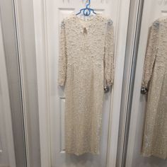 In Good Condition. Pictured Disclosures : Some Yellowing, Some Loose Or Missing Pearls And/Or Sequins. Gown Is In Overall Good Condition For Its Age Just Needs A Little Attention Cream Sequin Dress For Formal Occasions, Formal Cream Sequined Dresses, Elegant Cream Sequin Dress, Elegant White Sequined Maxi Dress, White Long Sleeve Gown With Sequins, White Long Sleeve Sequin Gown, Embellished White Maxi Dress For Wedding, White Embellished Maxi Dress For Wedding, Formal White Long Sleeve Mother Of The Bride Dress