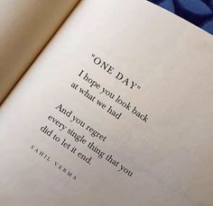 an open book with the words one day on it