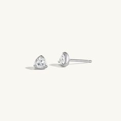 Details td {border: 1px solid #ccc;}br {mso-data-placement:same-cell;} td {border: 1px solid #ccc;}br {mso-data-placement:same-cell;} Solid 14K gold architectural studs with prong set trillion diamonds. Measurements Carat Weight: 0.44 Shipping Each piece of jewelry is carefully hand fabricated in our NYC studio so please allow 2-3 weeks for delivery. If you would like to request a rush order please contact the studio at sophie@sophieratner.com. Selecting faster shipping options will not speed up Formal White Gold Trillion Cut Jewelry, Trillion Cut Formal Earrings, Formal Jewelry With Trillion Cut Diamond Accents, Formal Jewelry With Diamond Accents In Trillion Cut, Formal Trillion Cut Jewelry With Diamond Accents, Classic Trillion-cut Platinum Jewelry, Classic Trillion Cut Platinum Jewelry, Classic Platinum Trillion Cut Jewelry, Sterling Silver Formal Jewelry With Trillion Cut