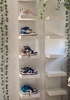 there are many shelves with shoes on them