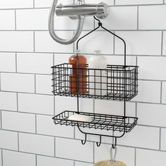 a shower caddy with soap and lotion bottles hanging from it's side