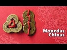 two chinese coins with the word monedas china written on them next to each other