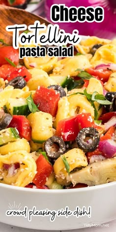 a pasta dish with pineapples, tomatoes, and mushrooms in a white bowl