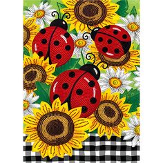 ladybugs and sunflowers on a checkered table cloth