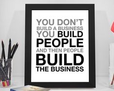 a black and white poster with the words you don't build a business, you build people and then people build the business