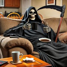 a skeleton sitting on a couch holding a coffee cup