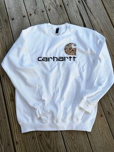 "Carhartt Inspired Cheetah Crewneck 50% Cotton - 50% Polyester Items are made to order, so please allow 1-2 week turn around time before shipping. Washing Instructions:  Turn garment inside out Machine wash COLD Tumble dry at low heat Do NOT iron  THIS IS NO WAY AFFILIATED WITH CARHARTT APPAREL OR BRAND. I AM IN NO WAY DISCREDITING, DEGRADING, OR MOCKING THE BRAND. I DO NOT CLAIM TO OWN THIS LOGO. THE SHIRTS BEING PURCHASED WITH THIS LOGO ARE DONATION ONLY & BY CHECKING OUT YOU ARE AGREEING THAT THIS IS A \"TIP\" or DONATION FOR MY SMALL BUSINESS" Leopard Print Carhartt Hoodie, Carhartt Sweatshirt, Carhartt Logo, Dream Outfits, Holiday Shirts, Washing Instructions, No Way, Inside Out, Small Business