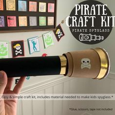 the pirate craft kit is being held up in front of a wall with pictures on it