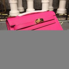 SHOP MORE LUXURY PRODUCTS HERE Description Hermes Mini Kelly KP Pochette Rose Tyrien For Women Gold Toned Hardware 8.7in/22cm Measurements: 22 x 7 x 14 cm / 8.7 x 3 x 5.5 inches (Length x Width x Height) In the 1930s, Robert Dumas, son-in-law of ÃƒÂ¯Ã‚Â¿Ã‚Â½ÃƒÂ¯Ã‚Â¿Ã‚Â½ÃƒÂ¯Ã‚Â¿Ã‚Â½ÃƒÂ¯Ã‚Â¿Ã‚Â½ÃƒÂ¯Ã‚Â¿Ã‚Â½mile HermÃƒÂ¯Ã‚Â¿Ã‚Â½ÃƒÂ¯Ã‚Â¿Ã‚Â½ÃƒÂ¯Ã‚Â¿Ã‚Â½ÃƒÂ¯Ã‚Â¿Ã‚Â½s, whom he succeeded at the head of HermÃƒÂ¯Ã‚Â¿Ã‚Â½ÃƒÂ¯Ã‚Â¿Ã‚Â½ÃƒÂ¯Ã‚Â¿Ã‚Â½ÃƒÂ¯Ã‚Â¿Ã‚Â½s (1951-1978), created the Women’s bag with High-end Pink Shoulder Bag With Gold-tone Hardware, High-end Pink Shoulder Bag For Evening, High-end Pink Shoulder Bag, High-end Pink Office Bag, Designer Pink Shoulder Bag For Formal Occasions, Trapezoid Shape, Dior Shirt, Mini Kelly, Gucci Shirt