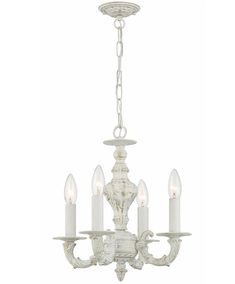 a white chandelier with five candles hanging from it