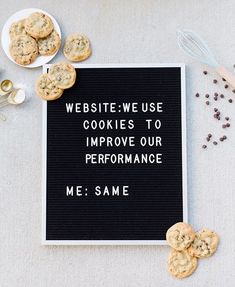 cookies are arranged around a sign that says website - we use cookies to improve our performance