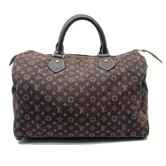 Louis Vuitton Speedy 30 Brown Monogram Idylle Canvas Ladies Handbag Brand - Louis Vuitton Model - Speedy 30 Size - 30 Material - Monogram Idylle Canvas Color - Brown Size- 11.5" W x 7.5" H x 7" D Handle Drop- 4" Outside - Canvas has wear due to age/use, Heavy stains on side canvas, water damage to leather handles and trim. Scratches on leather hardware. Fading on gold tone hardware.  CHECK PICTURES Inside - No rips or tears. Heavy Stains. CHECK PICTURES Corners - Light scuffing Includes - HANDBA Pre-owned Monogram Canvas Bag For Daily Use, Pre-owned Monogram Canvas Bags For Everyday Use, Vintage Monogram Canvas Satchel, Pre-owned Monogram Canvas Rectangular Shoulder Bag, Vintage Monogram Canvas Rectangular Shoulder Bag, Vintage Monogram Canvas Satchel For Travel, Pre-owned Rectangular Monogram Canvas Shoulder Bag, Pre-owned Monogram Canvas Travel Bag, Vintage Formal Monogram Canvas Satchel