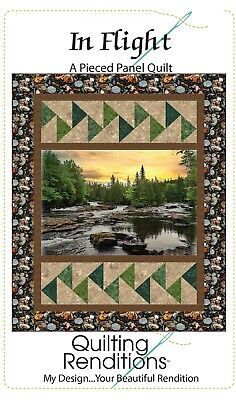 the cover of quilting renditions in flight, featuring a river and forest scene