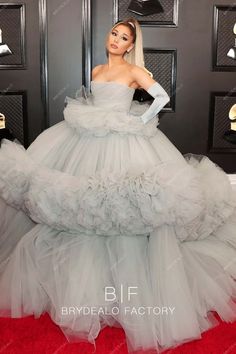 Ariana Grande Cinderella Grammys 2020 Grey Celebrity Ball Gown Dress. This ultra-luxury strapless gray tulle red carpet dress achieve Cinderella Vibes for Ariana Grande at 2020 Grammys. Empire waist elongates her figure. shown color: silver & grey bra support: with cups boning: yes closure: back zipper lining: fully lined Met Gala Ariana Grande, Met Gala Gowns, Ariana Grande Met Gala, Grammy Awards 2020, Ariana Grande Grammys, Dance Fits, Grammys 2020, Grammy Dresses, Dream Villa