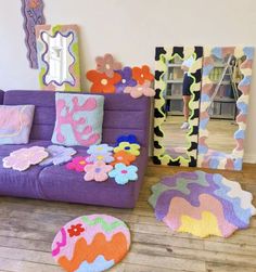 a living room filled with lots of colorful furniture