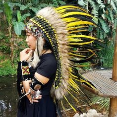 Yellow Feather Indian Headdress ReplicaThis Headdress is 100% handmade from feathers.* Head circumference: 59 centimeters / 23 inches* Length : MediumWHY US?* 100% Handmade and Eco Friendly Product* Finest Quality - Each item will go through a Quality Control process before shipping.* No Markup Price* Every purchase supports Balinese Artisans - All Artisans will keep on following their passions whileproviding for their families.SHIPPING* Estimated around 3-7 business days.* We provide tracking i Ostrich Feather Trim Headpieces For Festivals, Carnival Festival Costume Hats With Feathers, Festival Costume Hats And Headpieces With Feathers, Festival Feathered Costume Hat, Festival Costume Hat With Feathers, Indian Hat, Native American Feathers, Festival Costume, Yellow Feathers