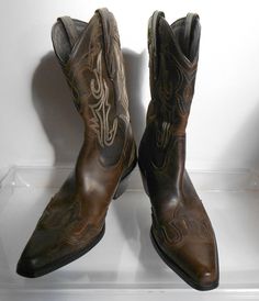 "Leather upper Man made materials Great condition - slight wear signs Copper inlay Dimensions: Length 12\" Ball for foot 4\" Heel height 2 1/4\"" Southwestern Brown Snip Toe Boots, Brown Southwestern Snip Toe Boots, Distressed Brown Western Boots For Western-themed Events, Western Distressed Brown Boots For Western-themed Events, Western Style Distressed Brown Boots For Western-themed Events, Brown Western Boots For Western-themed Events, Western Boots For Rodeo In Vintage Brown, Brown Hand Tooled Boots For Western-themed Events, Western Style Boots For Rodeo In Vintage Brown