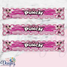 three pink candy bars with the words sour punch printed on them and mickey mouse faces