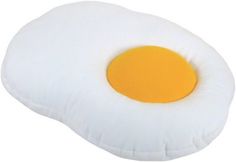 an egg shaped pillow is shown on a white background with the yellow circle at the center