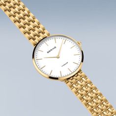 Ladies Titanium  New In: Our new ladies' watches from the Titanium Collection are truly eye-catching. Available in silver, gold and a bicolor look, they are the perfect choice for fashion-conscious women looking for an elegant and robust watch.  The watches are made of high-quality titanium. This material is extremely strong, ultra-light and hypoallergenic. The titanium bracelets fit smoothly and give the watch an elegant and delicate look. The high wearing comfort makes them perfect for daily u Gold Minimalist Watch With Metal Dial, Minimalist Gold Watch With Metal Dial, Elegant Gold Watch With Polished Finish, Classic Yellow Gold Analog Jewelry And Watches, Gold Minimalist Watch With Polished Finish, Elegant Yellow Gold Watch For Everyday Wear, Elegant Yellow Gold Watch For Everyday, Elegant Yellow Gold Everyday Watch, Modern Yellow Gold Jewelry With Subdials