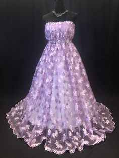 Beautiful Embroidery light Purple color lace with rhinestone beads. Eco- Friendly. Breathable. Good quality. Width 50”. Purple Embellished Tulle Gown, Embroidered Fitted Gown For Pageant, Embellished Lace Gown For Banquet, Embellished Floor-length Net Dress, Floor-length Embellished Net Dress, Embroidered Lace Prom Gown, Embroidered Lace Gown For Prom, Elegant Floral Embroidered Dress For Pageants, Elegant Dresses With Floral Embroidery For Pageant