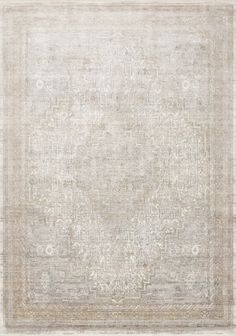 an area rug with white and beige colors